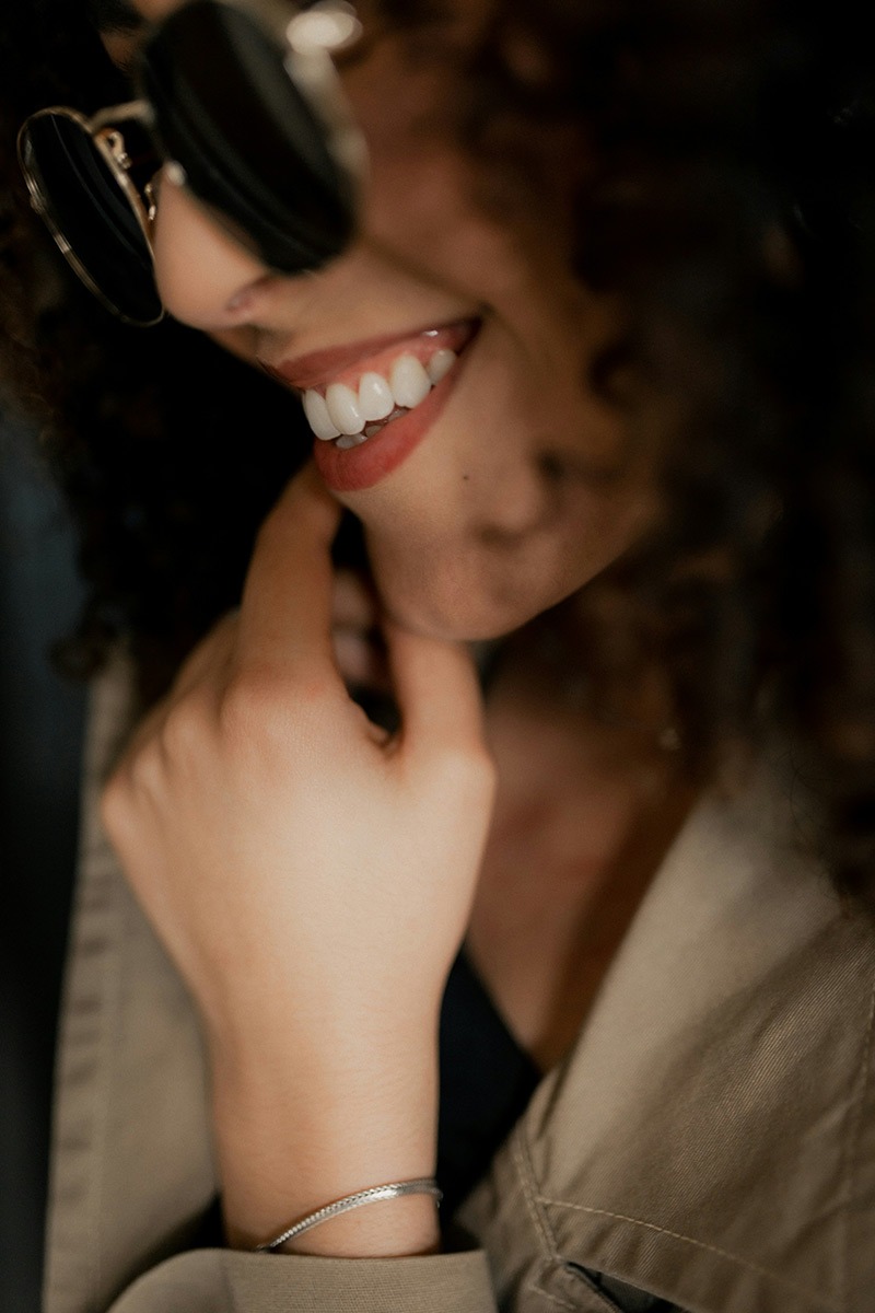 Smiling woman with whitened teeth